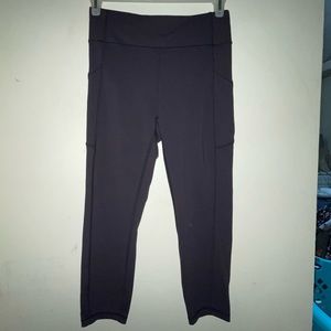 Lululemon, black capri leggings with side pockets, size 10